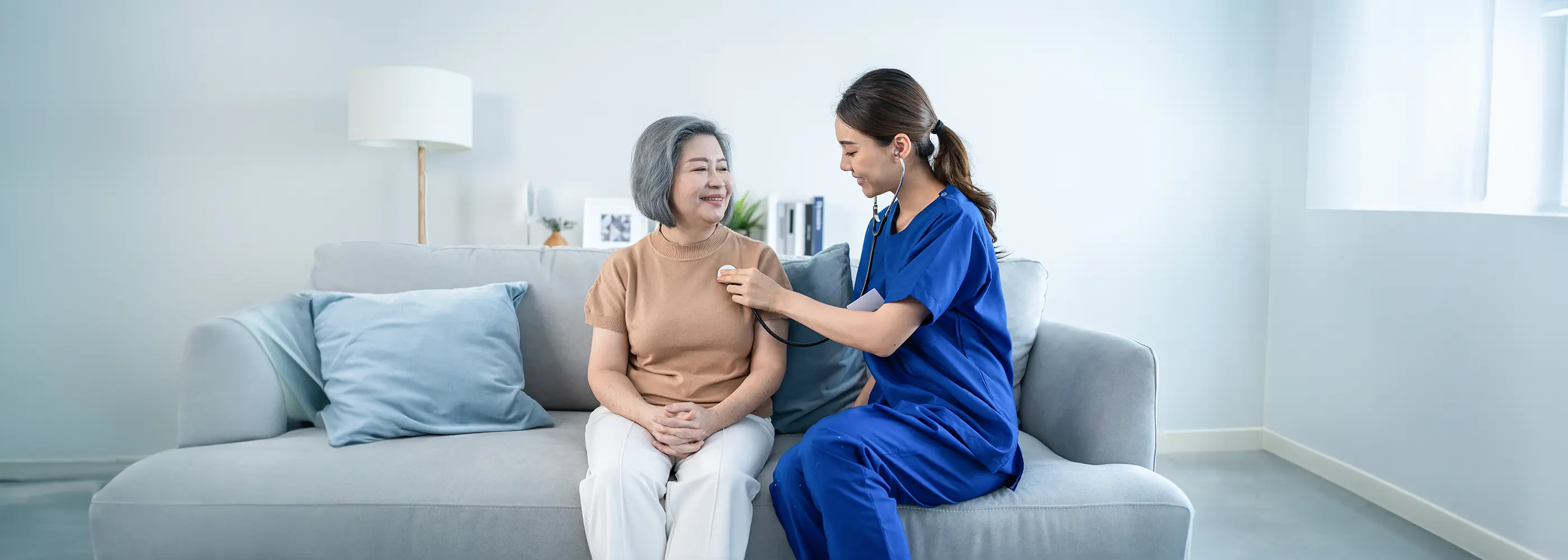 Doctor performs health screening to a patient banner